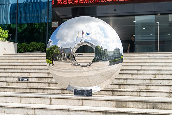 Polished Stainless Steel Circular Disc Sculpture for Outdoor Spaces